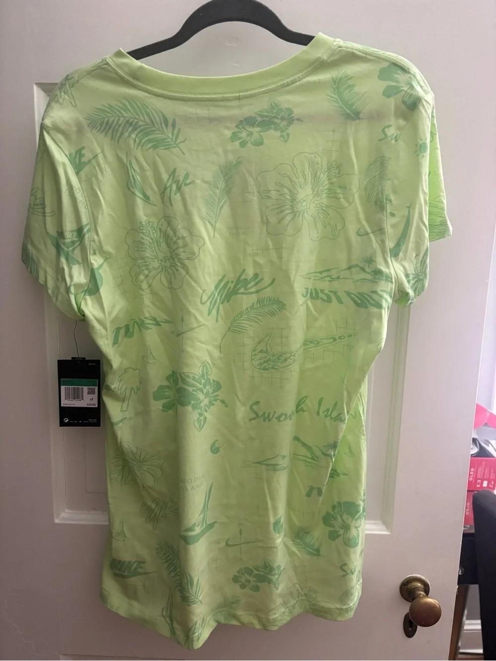 Nike Short-Sleeve Neon Green Tropical Graphic Tee with Multicolor Logo